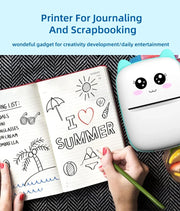 💎 Versión principal (atractiva y clara para tienda Azlo):  🐾 Impresora Térmica Portátil Mini con Diseño de Gato | Impresora de Etiquetas Bluetooth 58 mm – Inalámbrica para Android e iOS